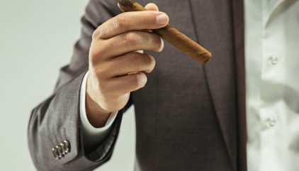 makao-the-barded-man-in-suit-holding-cigar